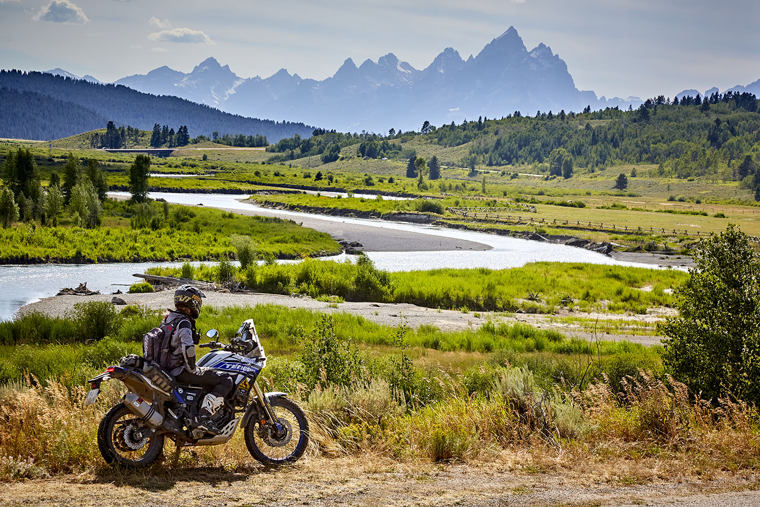 Wyoming motorcycle riding with rivers and mountains in the distance