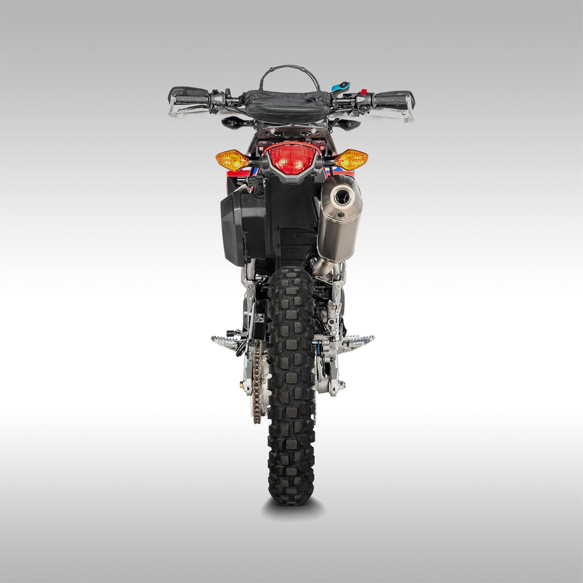 Akrapovice slip-on exhaust for the Honda CRF300L and CRF300L Rally. Off-Road  specific design from the engineeres at Akrapovic. Stainless steel and titanium construction.