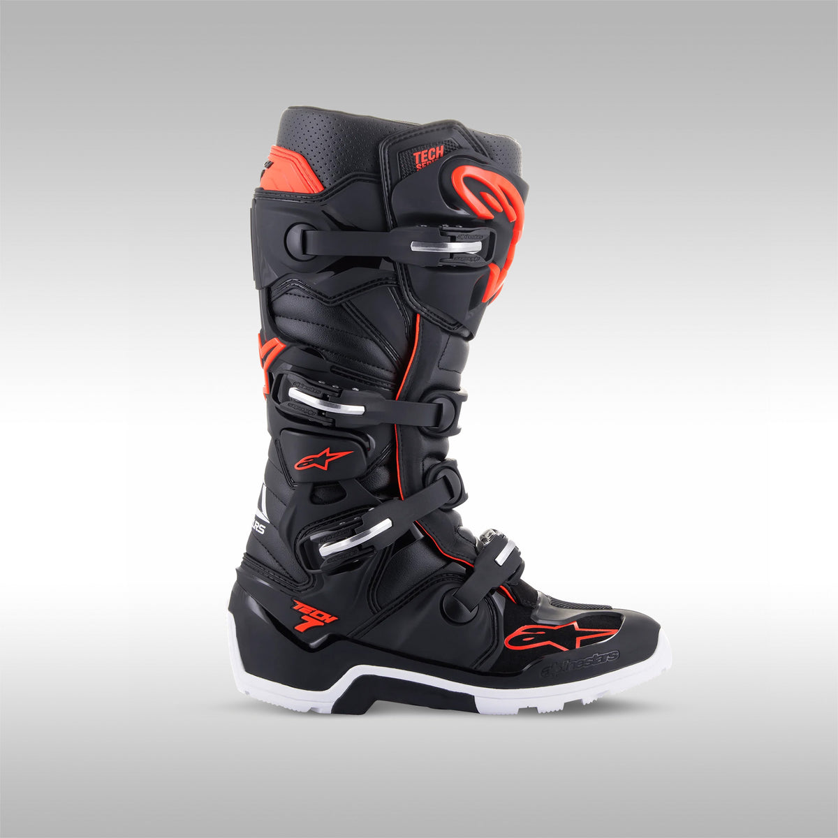 Alpinestars Tech 7 Enduro boots in the Light Gray, Dark Gray with Bright Red accent option. Single boot. Enduro and dualsport motorcycle boots. Protective gear for dirtbike riding.