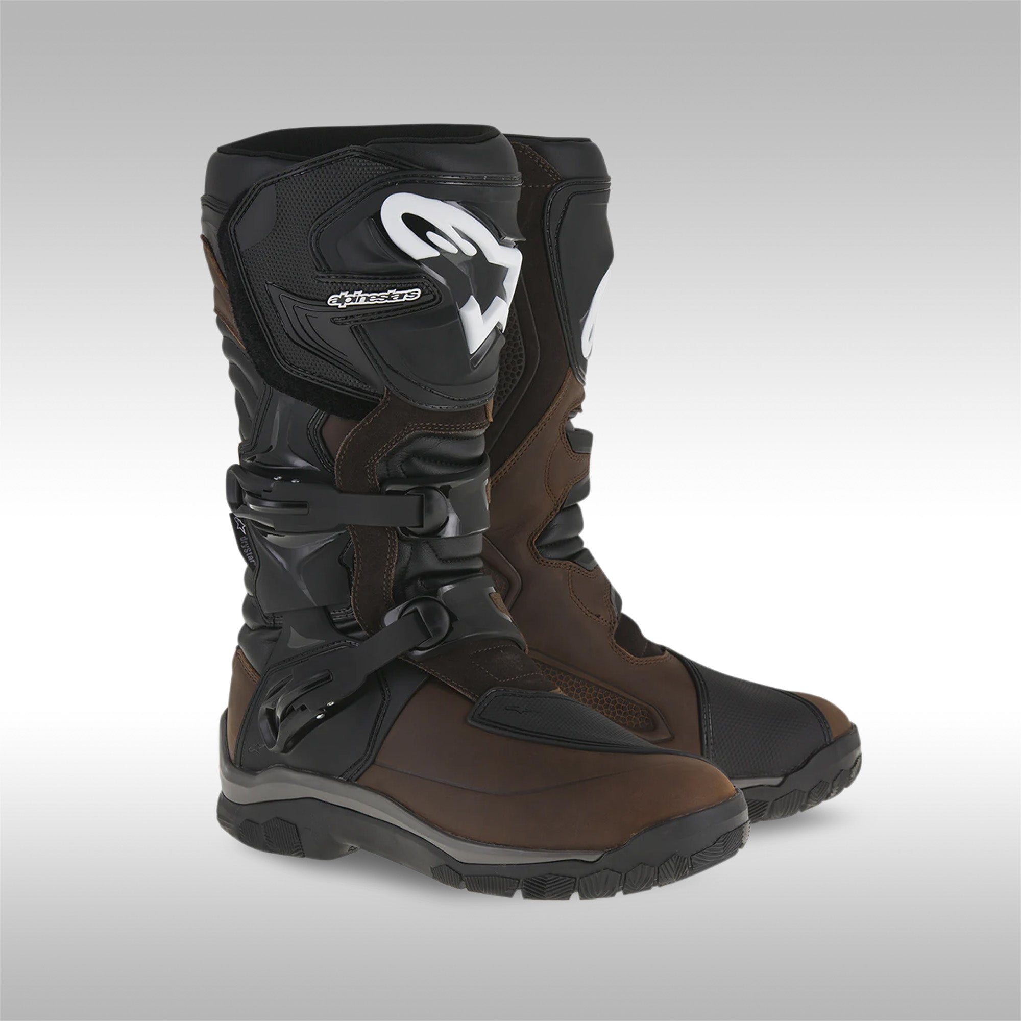 Side profile of a pair of Alpinestars Corozal Adventure boots in brown oiled leather.