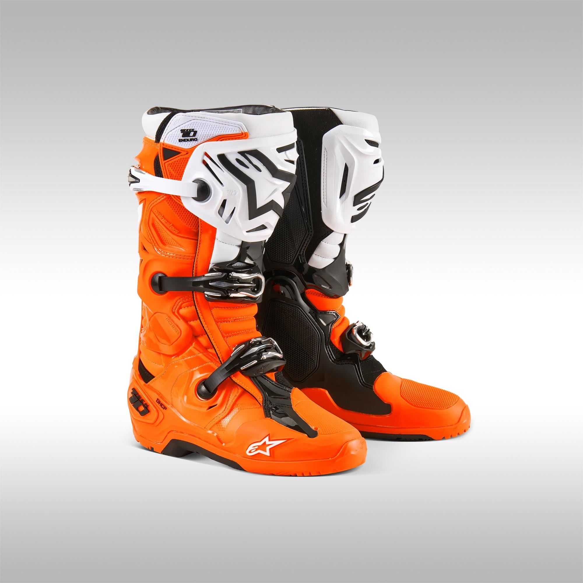 Alpinestars Tech 10 Enduro offroad boots in the Orange and White color option.