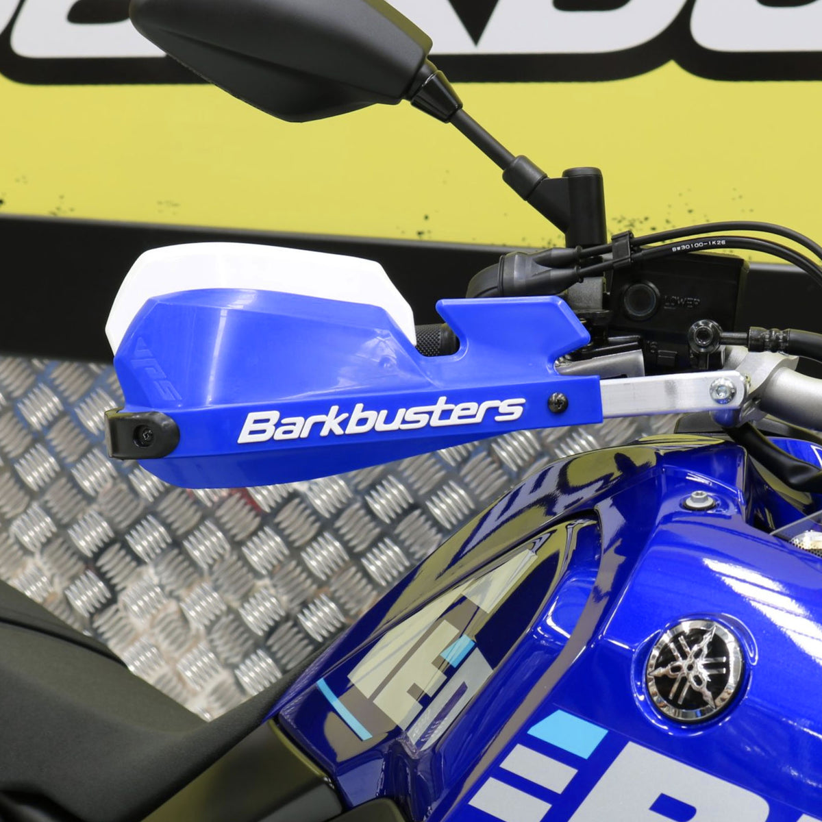 Barkbuster hand guards installed on a Blue Tenere 700. Blue and White VPS shields.
