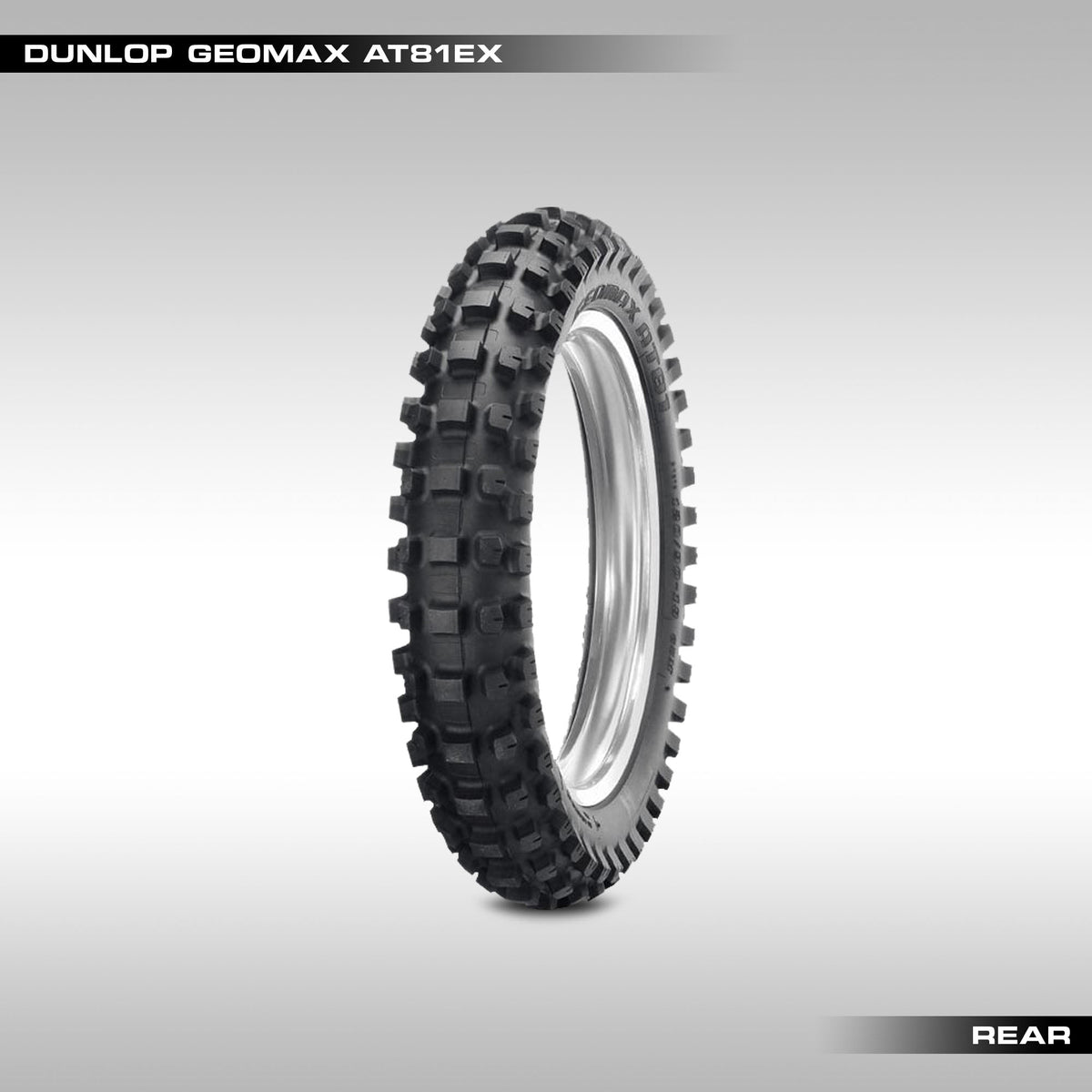 Front 3/4 view of the Dunlop AT81EX offroad tire. Black rubber offroad tire developed for hard enduro. Gummy dirtbike compound that actually holds up reasonably well. 