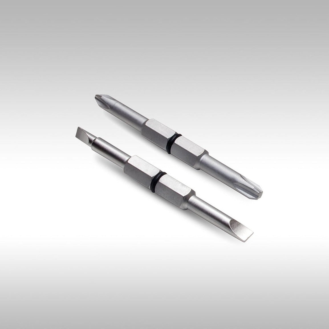 Motion Pro Tools bit set. Two bits with two tips each for a total of 4 tools. Phillips #2 and Phillips #3. Slotted ends small and medium. Work great with the MP Tool Metric.