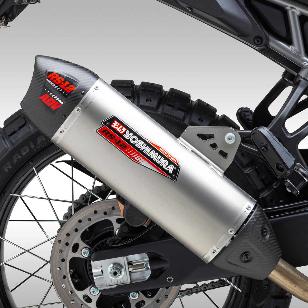 Installed close up side view of a Yoshimura RS-12 exhaust for the CFMOTO Ibex 450.