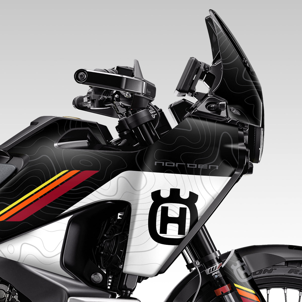 Cropped front, side profile of a Husqvarna Norden 901 adventure motorcycle with the Black Split Topo Graphics kit. This design features a topo pattern and some short stripes in red, orange and yellow.  Shown on the standard Norden 901